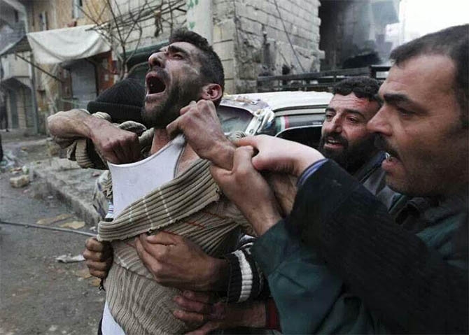 Iraklı Milisler, Suriyeli Çocukları Katletti 6