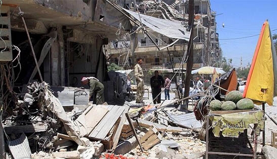 Suriye Uçakları IŞİD'in Elindeki Rakka'ya Bomba Yağdırdı 5