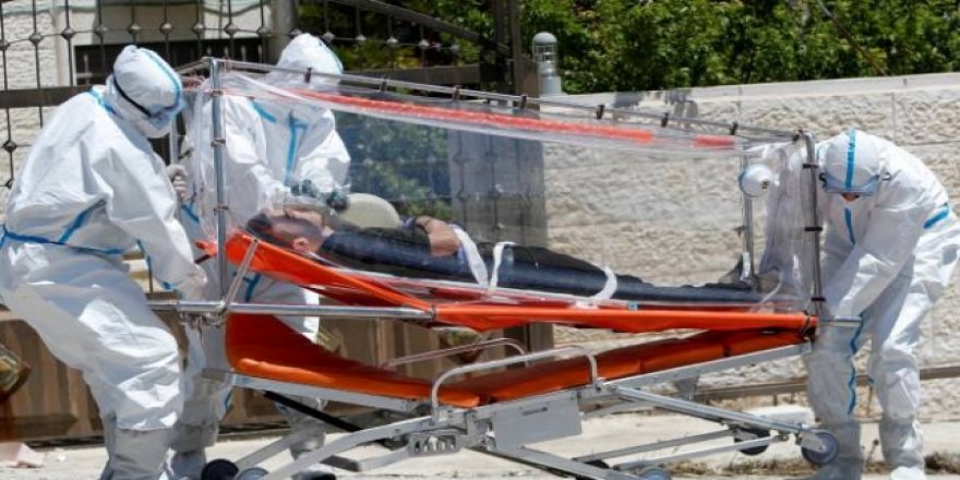 İran'da son 24 saatte COVID-19'dan 125 kişi hayatını kaybetti