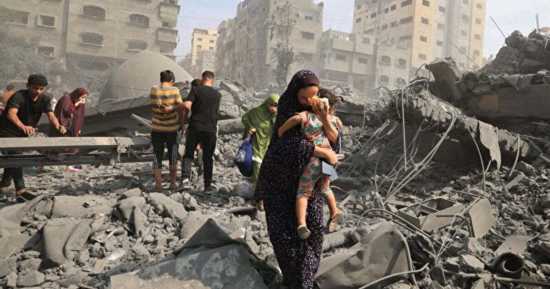 Gazze'de içi sivil dolu okul ve dokuz ev bombalandı