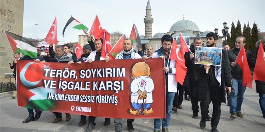 Sağlık çalışanları Gazze için "sessiz" yürüyüşlerini sürdürdü