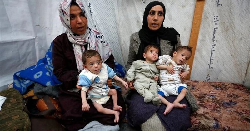 Filistinli anne açlıkla boğuşan üçüzlerinin hayatından endişe ediyor