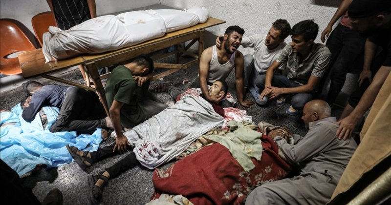 Gazze'nin kuzeyindeki Filistinliler yakınlarını kefensiz defnediyor