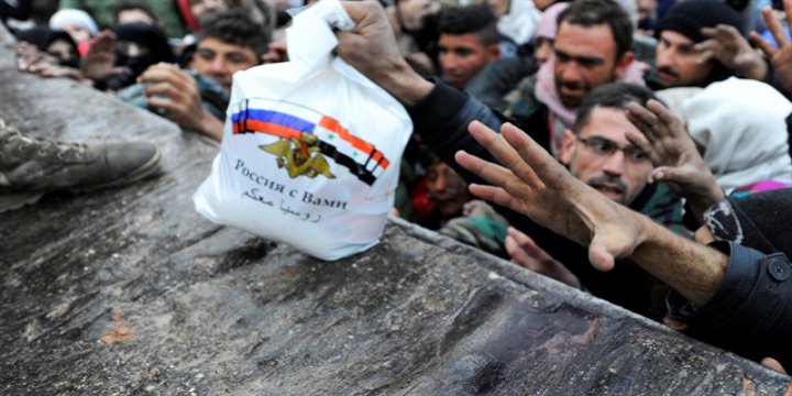 Katliamcı Rusya'dan Halepli Kurbanlarına Yardım Şovu!