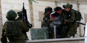 İsrail Askerleri 16 Filistinliyi Gözaltına Aldı
