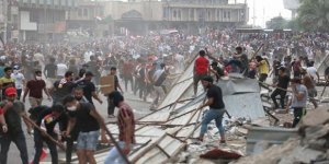 Irak'taki Göstericiler Şii Örgüt Binalarını Bastı: 30 Ölü