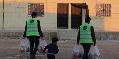 Özgür-Der Suriye'de kumanya ve kömür dağıttı