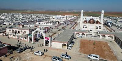Türkiye ve Katar'dan Suriye'de 1400 aileye yeni yuva