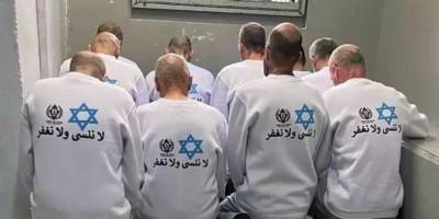 Soykırımcı İsrail’den tepki çeken uygulama: Esirlerin sırtına ırkçı sloganlar yazdılar