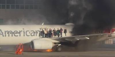 ABD'de bir yolcu uçağı havalimanındayken alev aldı