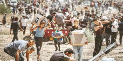 Gazzeliler yardım sırasında gazla katledildi