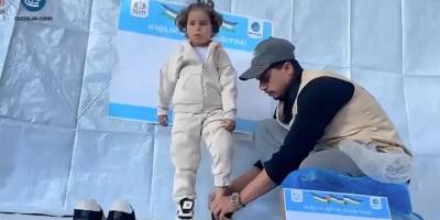 Bilgi ve Erdem Vakfı ile Özgür-Der Gazze'de kışlık elbise dağıttı