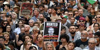 Avustralya polisi Siyonist Herzog'u protesto edenlere saldırdı