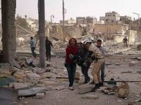 Rejimin  Şam ve Halep'te Hava Saldırısı
