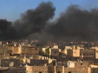 Halep'te Uçak Bombardımanlarına Karşı Lastik Yakıyorlar
