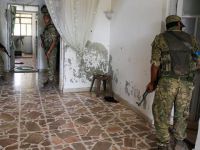 Direnişçiler Cerablus’ta IŞİD’in Boşalttığı Evlerde Arama Yapıyor